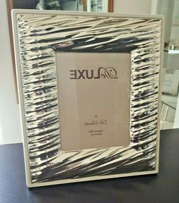 Cornice portafoto 15x20 in argento 925 lastra con motivo ril