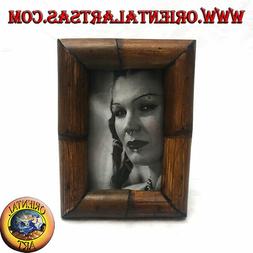 Cornice portafoto in legno di teak e bamb&ugrave; da 20x15 cm