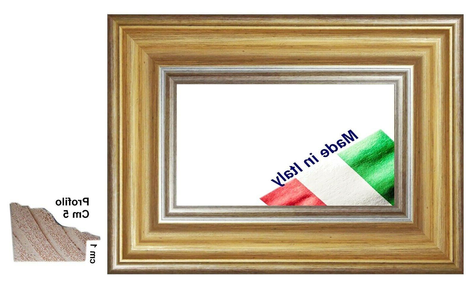 cornice argento e oro in legno per