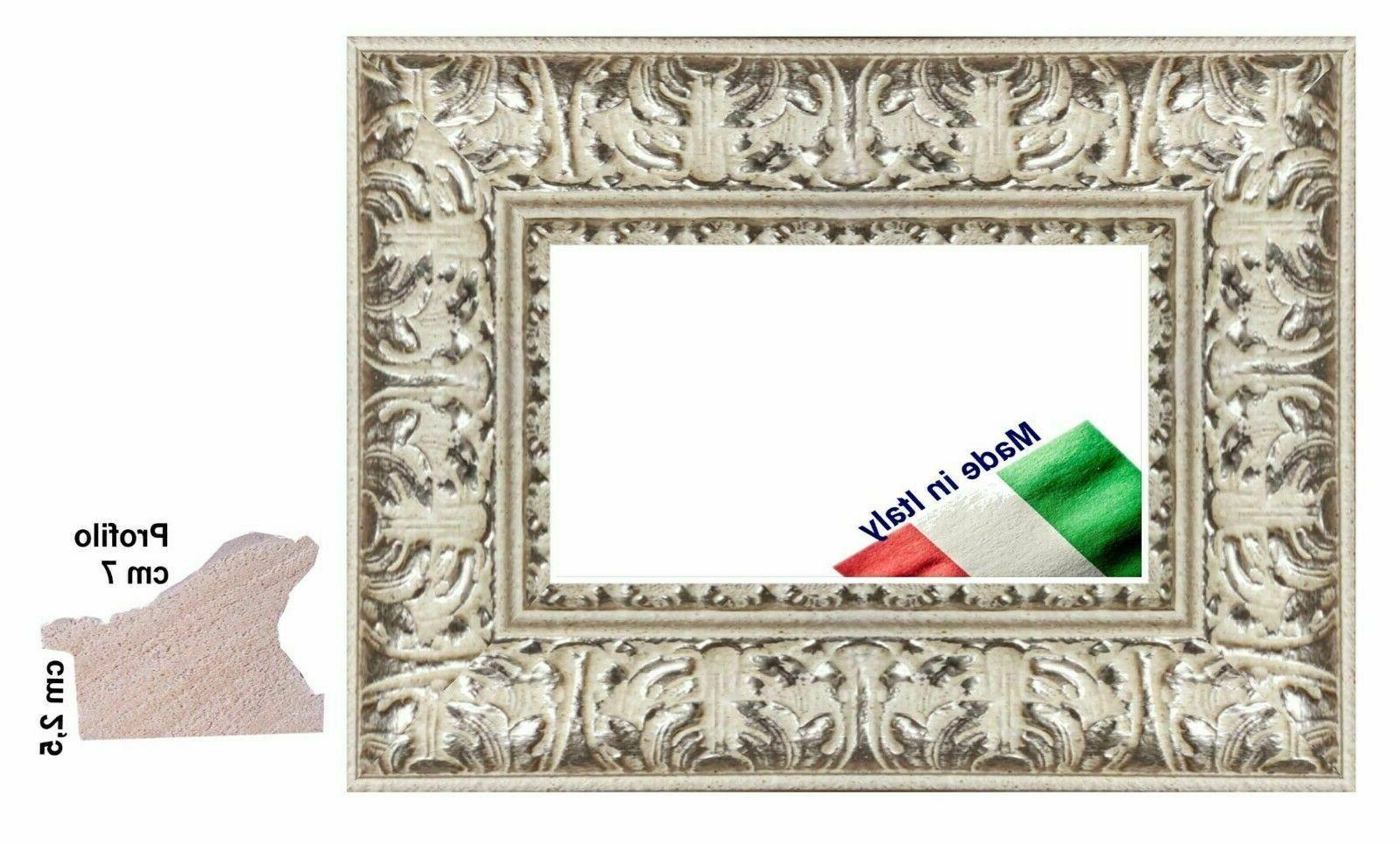 cornice bianca e argento intagliata per quadri