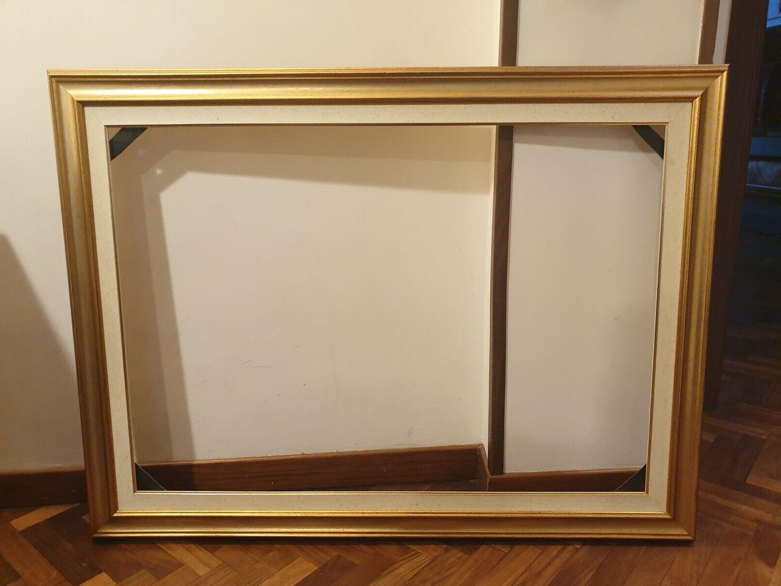 cornice dorata interno 100x70 cm con pass