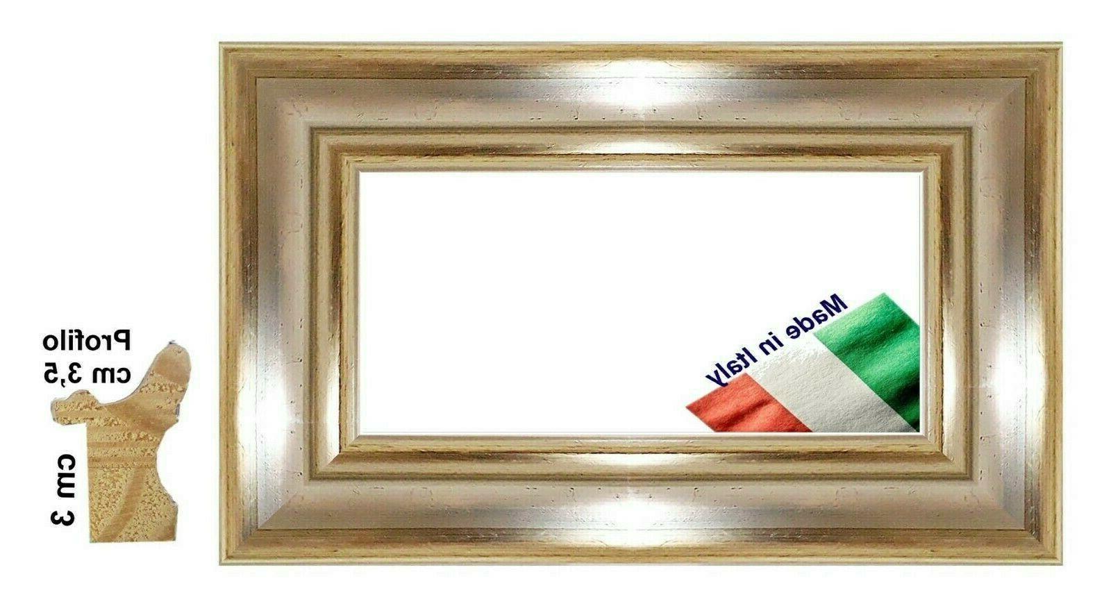 cornice in legno argento e mistura oro