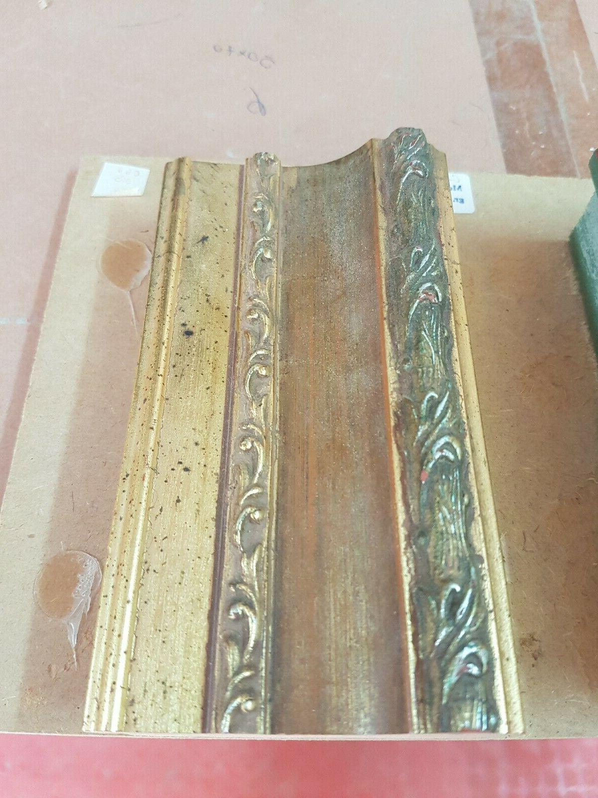 cornice in legno oro per quadri foto