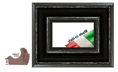 cornice nera shabby in legno sgusciata per