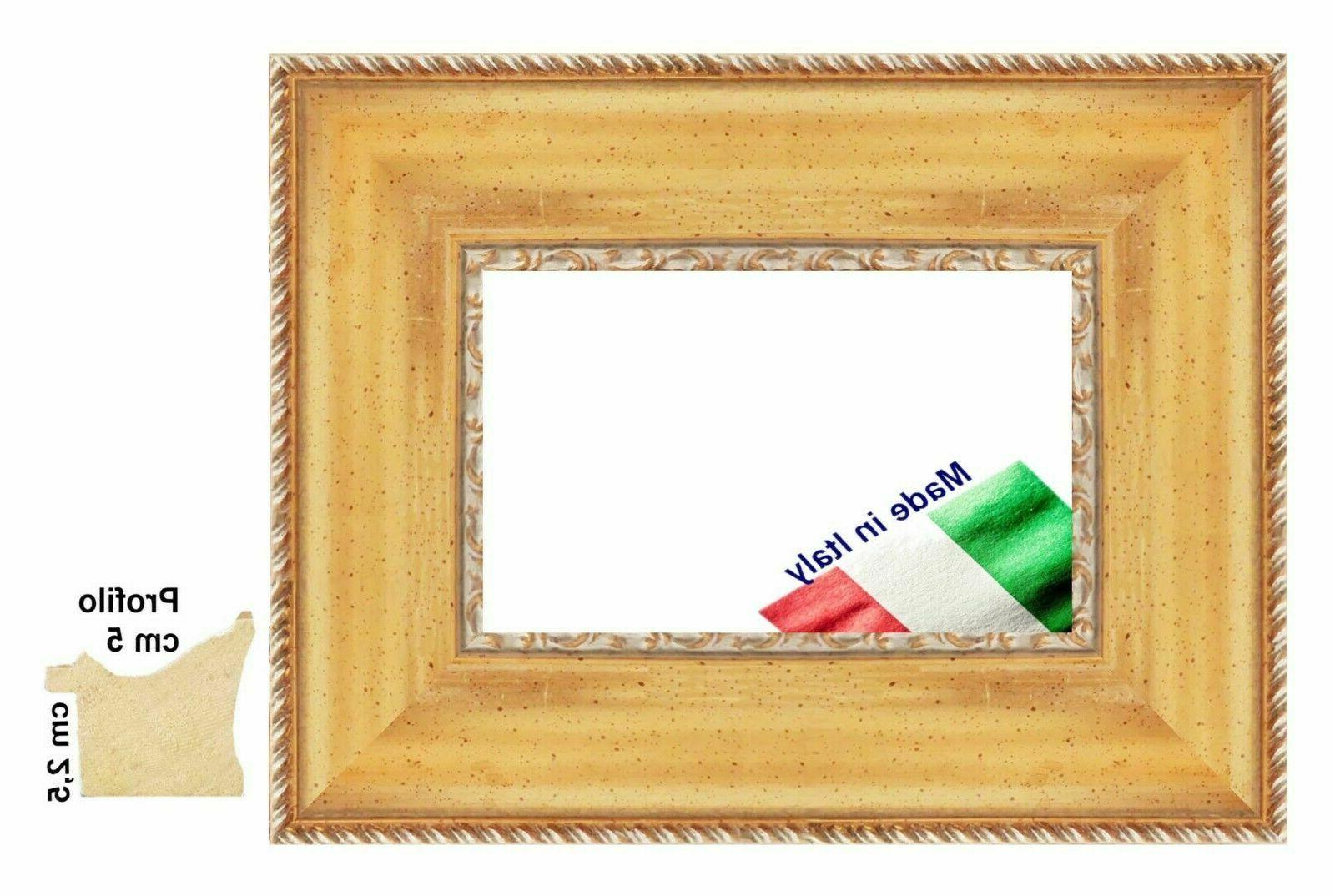 cornice oro in legno per quadri foto