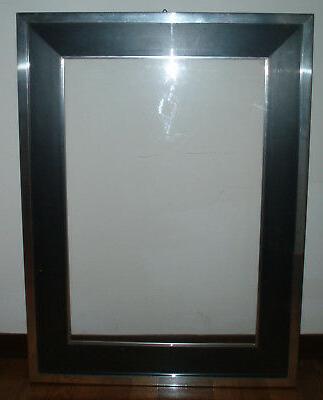 cornice per quadri con rivestimento in metallo
