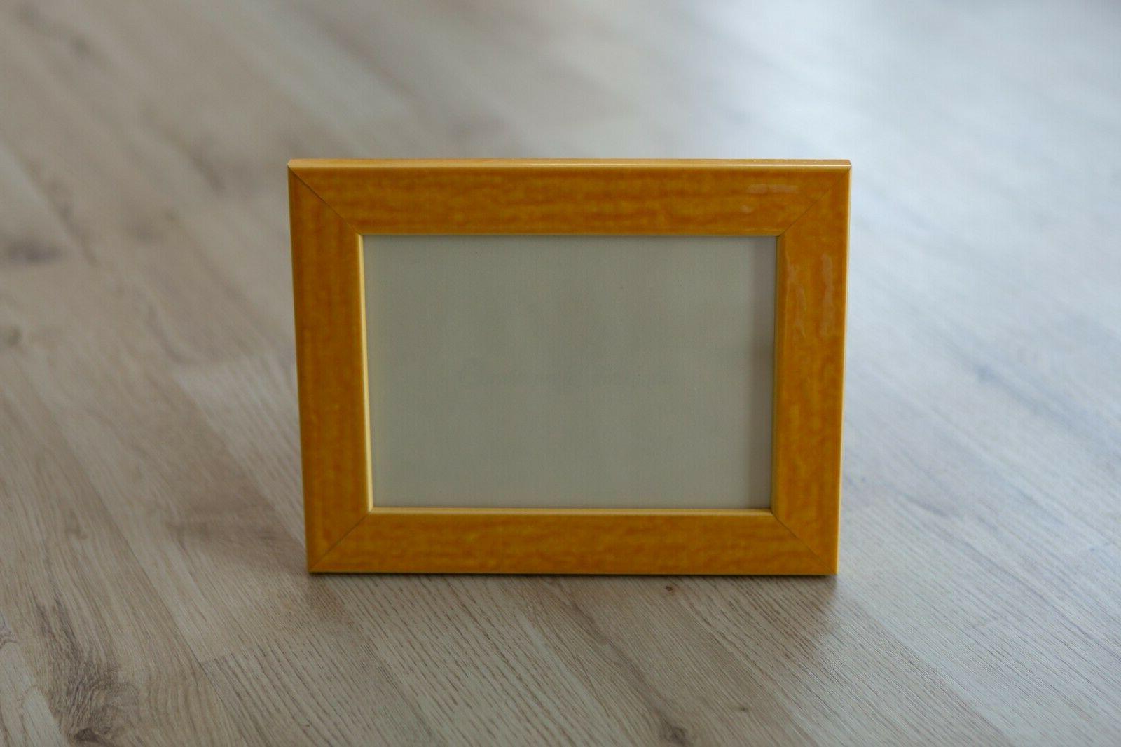 cornice portafoto in legno giallo per foto