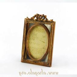 Portafoto in oro anticato Liberty con fiocco 9x13
